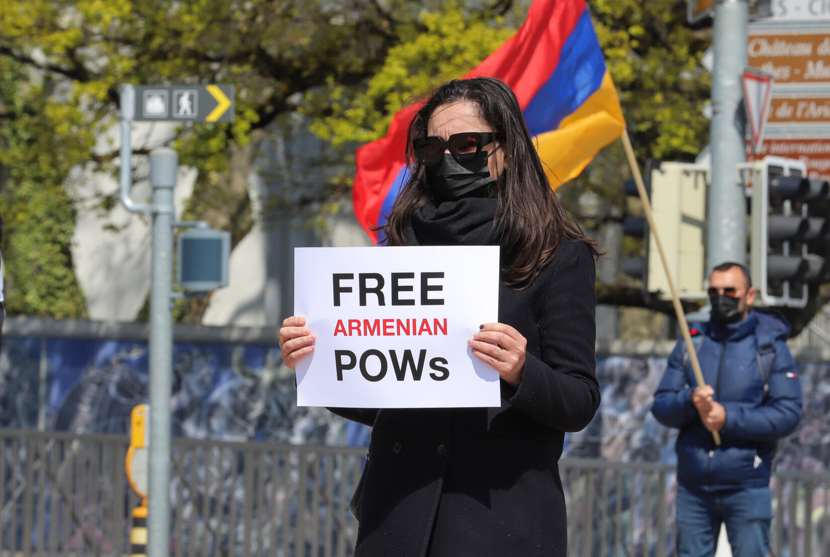 Protestor in Geneva -- Wikimedia Commons